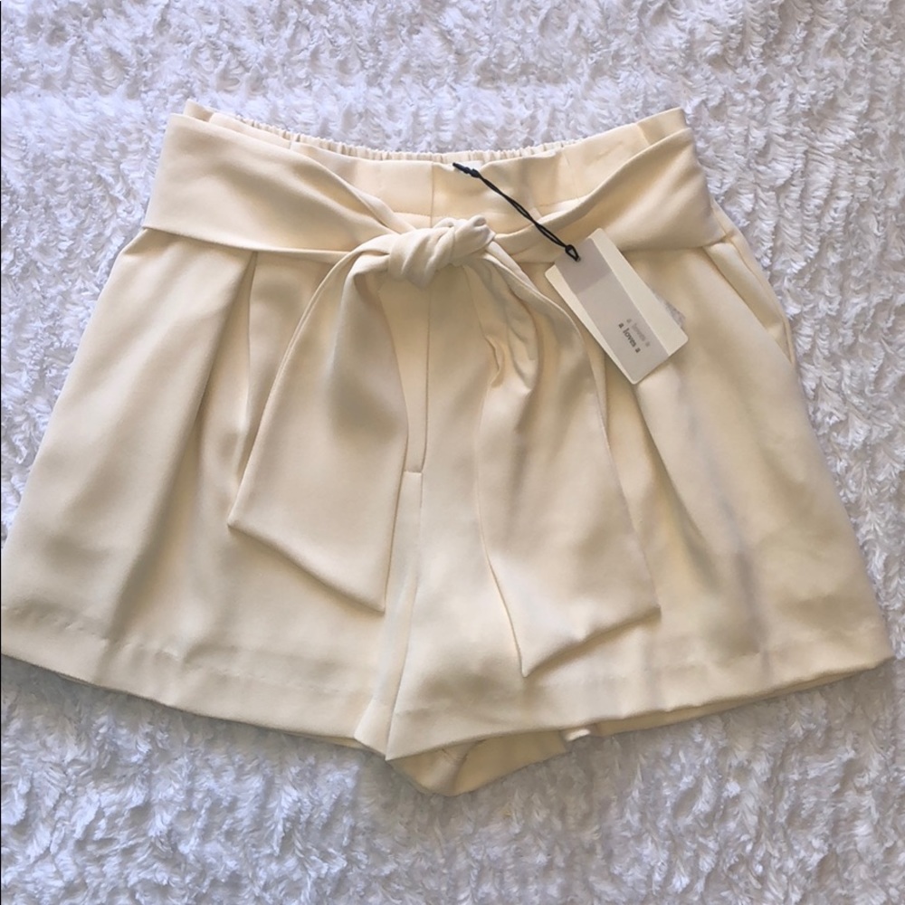 a loves a cream paper bag shorts